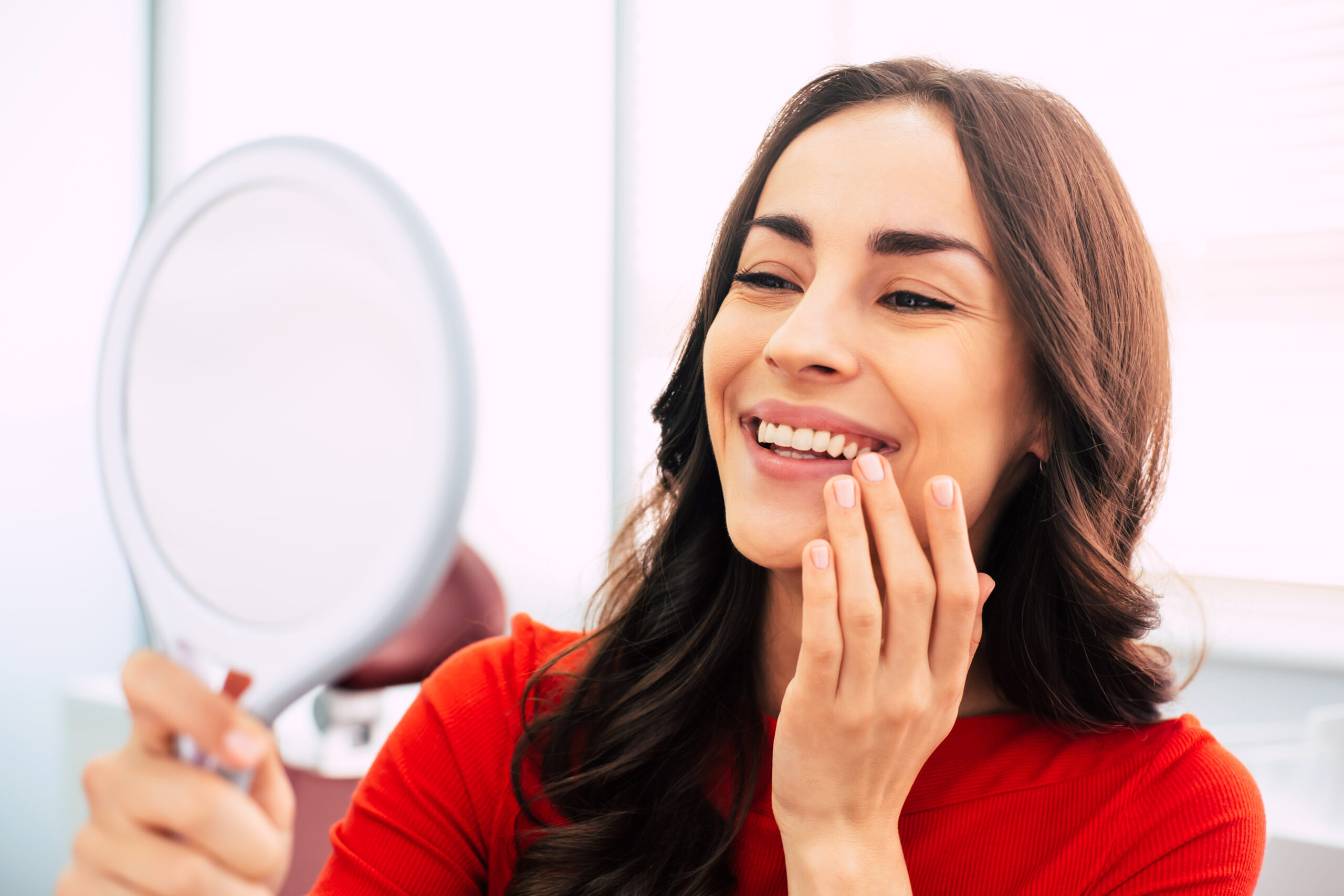 woman enjoying her new dental implants